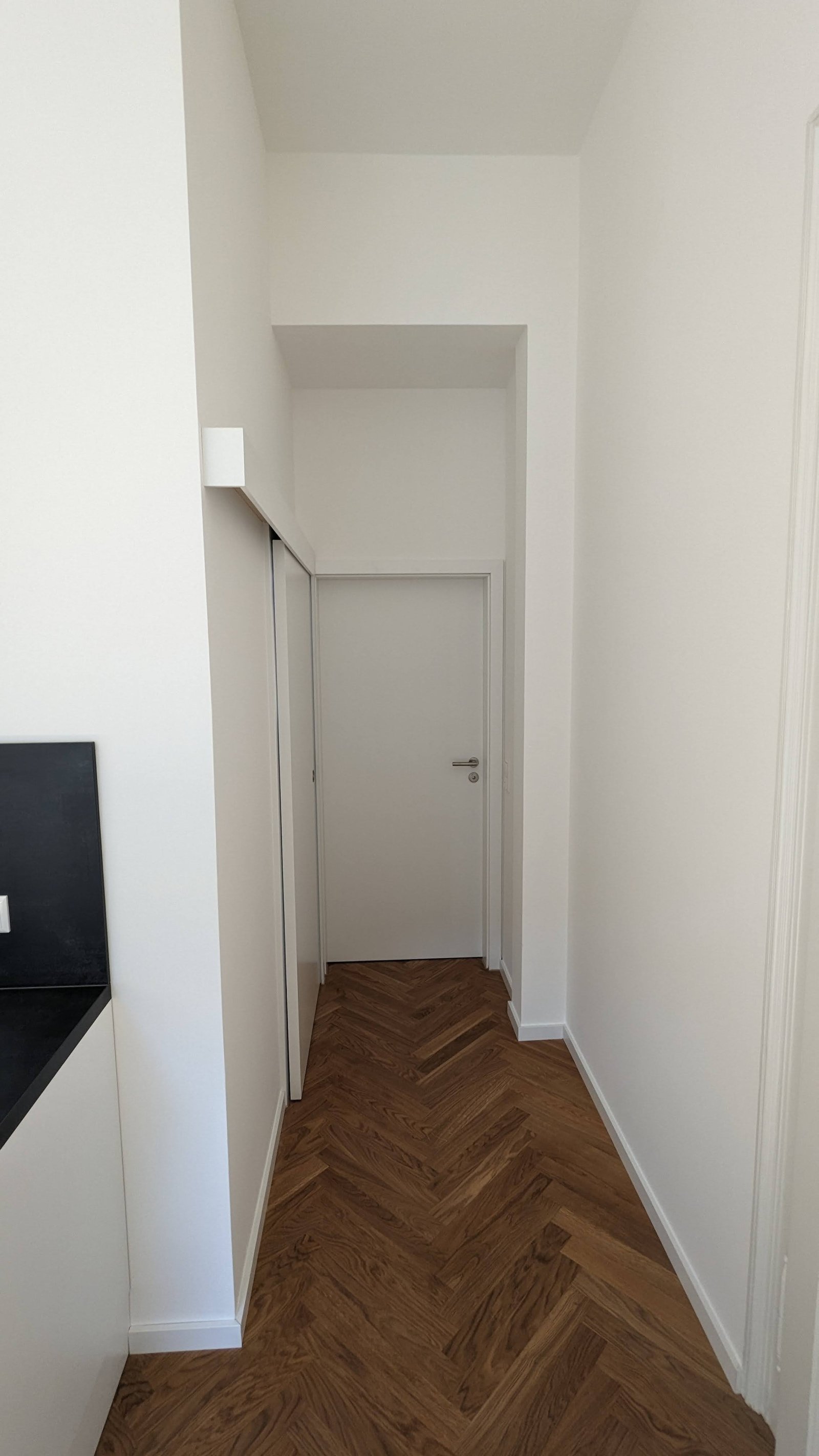 Gang zum Bad und Schlafzimmer (links)