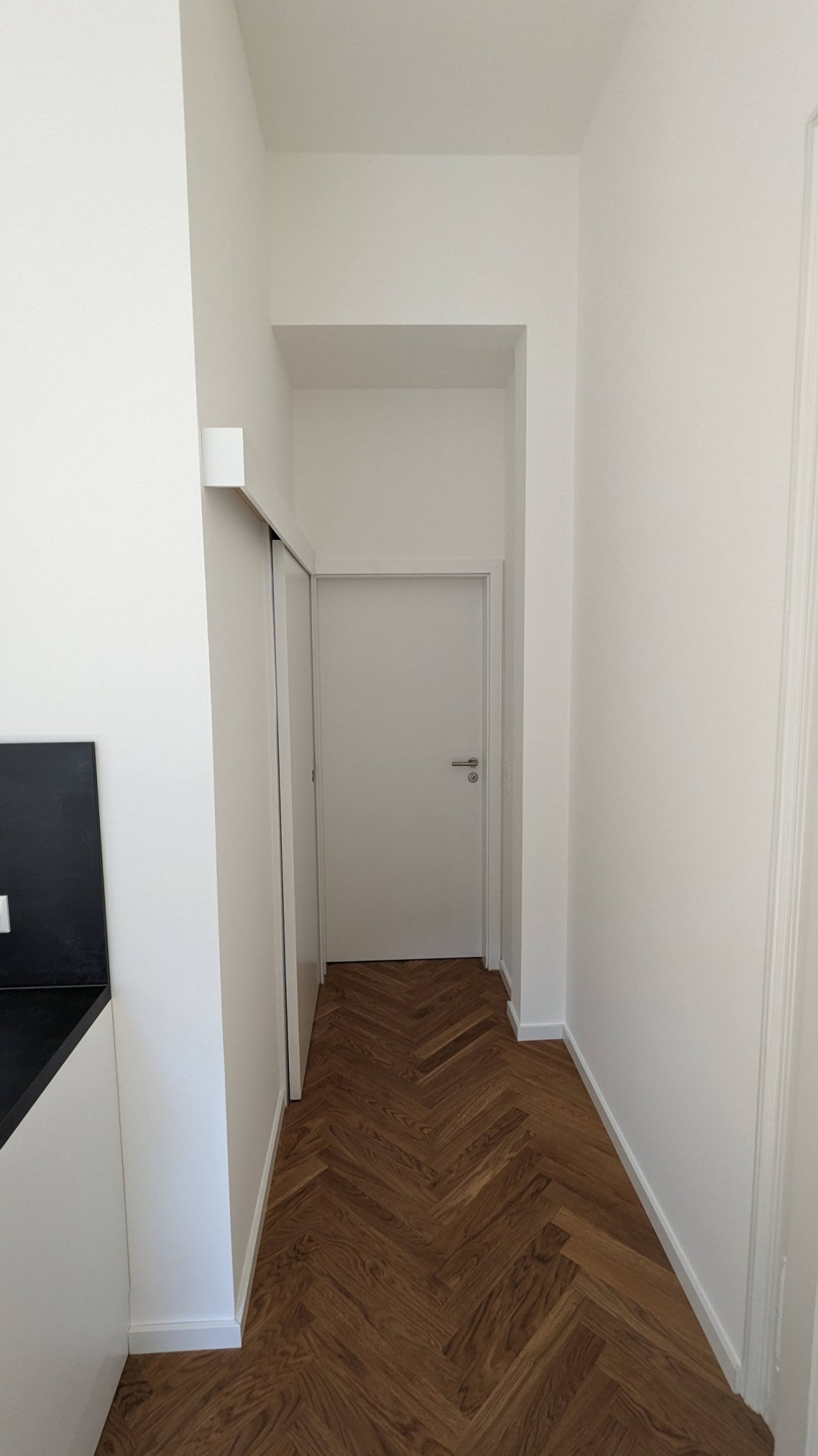 Gang zum Bad und Schlafzimmer (links)